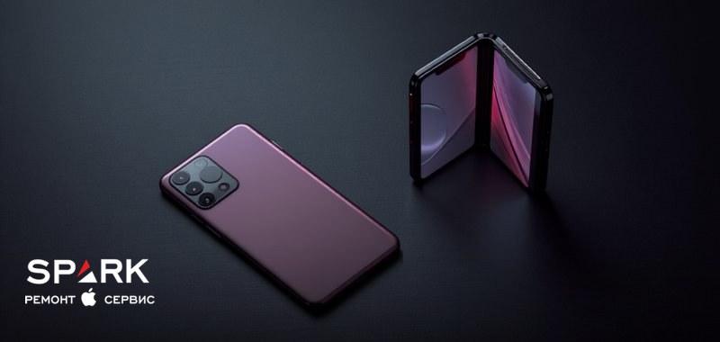 Бордовый флагманский смартфон и полураскрытый складной смартфон на тёмном столе